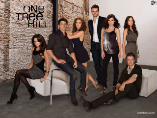 Group people posing brick wall - a picture in a room free wallpaper for desktop