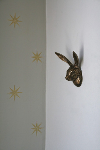 Metal rabbit head wall stars - a white wall free wallpaper for mobile