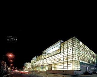 Building windows nighttime streetlight illuminated - weta digital free wallpaper