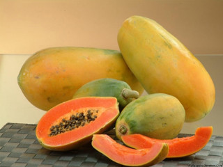 Papaya pile slices knife fork - a table top free wallpaper