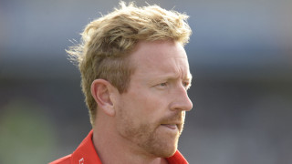 Man red shirt beard serious - the side with free wallpaper