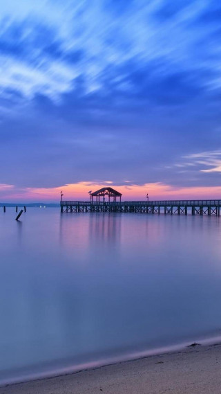 Pier beach sunset water clouds - free beach wallpaper