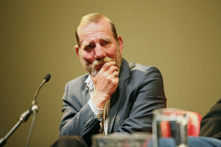 Bearded man suit microphone serious - a beard and a suit free wallpaper for desktop