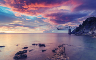 Bridge beach rocks sky cityscape - a sky in the background free wallpaper for desktop
