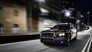 Police car night city street - a police car free wallpaper