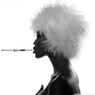 Woman feather hat smoking cigarette 2 - a cigarette free wallpaper for tablet