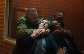 People hugging orange walls room - movie free wallpaper