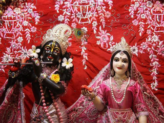 Hindu deities red backdrop flowers - figurine free wallpaper