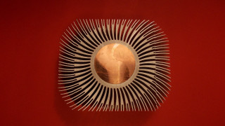 Circular object gold center red - product photo free wallpaper for desktop