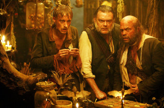 Three men table candles lit - candle free wallpaper