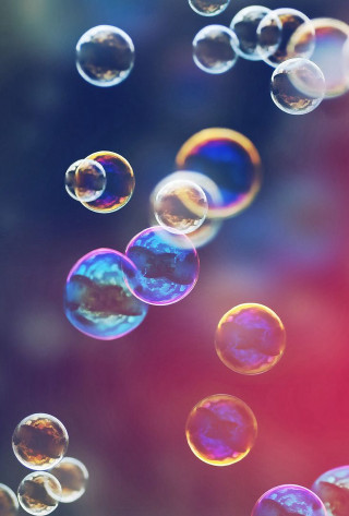 Soap bubbles floating blurry background - a microscopic photo free wallpaper for mobile