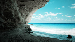 Person rock ocean cliff blue 3 - sense of depth free wallpaper for desktop