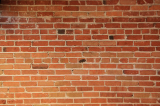 Red brick wall clock side - texture free wallpaper