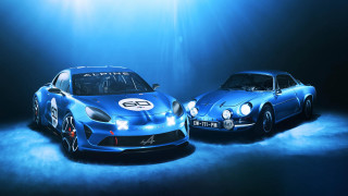 Two blue sports cars headlights - a light beam free wallpaper