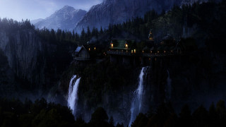 Castle cliff waterfall night lights 3 - a waterfall in the background free wallpaper for desktop