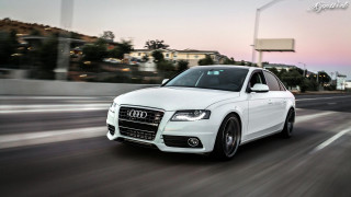 White car driving street sign - motion blur free wallpaper