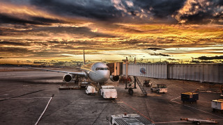 Plane parked tarmac airport sunset 2 - the tarmac free wallpaper