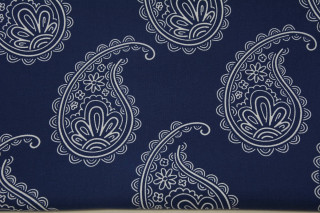 Blue white paisley pillow folded - a white surface free wallpaper