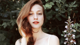 Woman flower hand bush background - leesha hannigan free wallpaper