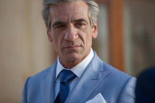 Man suit tie looking outside - a suit free wallpaper