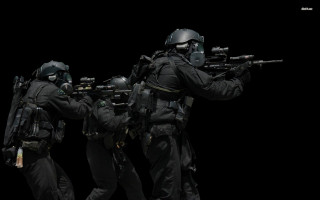 Soldiers black uniforms guns helmets - a group of soldiers free wallpaper