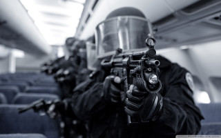 Man gun helmet plane passengers - a gun and a helmet free wallpaper