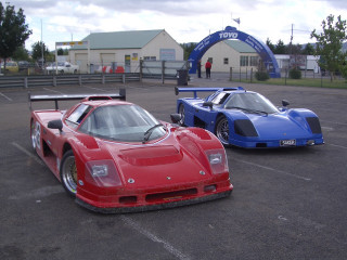 Race cars parking lot blue - free cars wallpaper