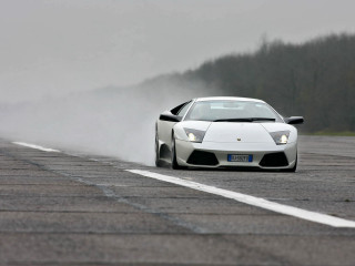White sports car dusty road - tire free wallpaper