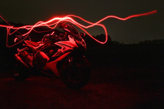 Motorcycle red light dark blurry - a motorcycle free wallpaper