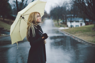 Woman holding umbrella wet road - free rain wallpaper for desktop