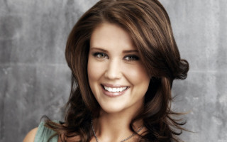 Woman smiling jewelry gray background - brown hair free wallpaper