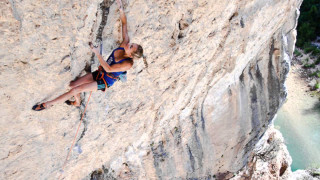 Woman climbing cliff rope helmet 2 - eva gonzalès free wallpaper