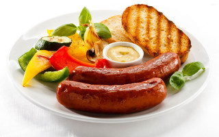 Plate sausages delicious grilled appetizing - a fork and knife free wallpaper