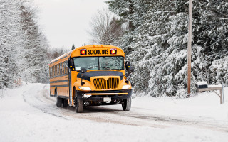 School bus snowy road woods - a snowy road free wallpaper