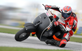 Motorcycle rider track grass building - a sign free wallpaper