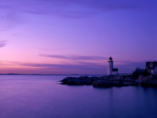 Lighthouse rocky shore sunset purple 2 - a small house free wallpaper