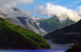 Mountain lake trees foreground clouds - sky above free wallpaper