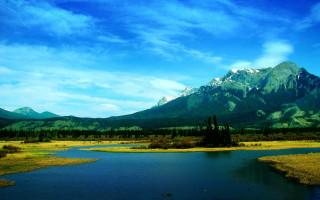 Lush green river mountains cloudy 2 - a lush green field next free wallpaper for desktop