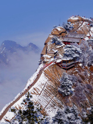 Mountain building snow fog blue - free winter wallpaper for mobile