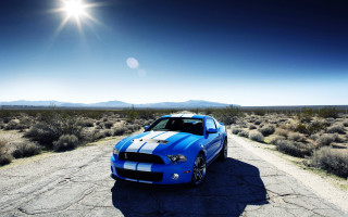 Blue mustang car desert road 5 - a road in the desert free wallpaper