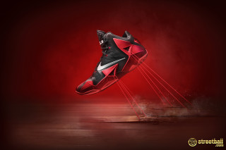 Flying shoes red background black - a pair of shoes free wallpaper