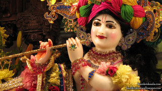 Statue woman flute flower hair 2 - her hand and a flower free wallpaper for desktop