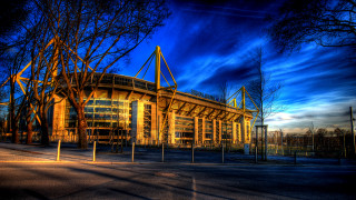 Stadium fence trees sunset blue - a stadium free wallpaper for desktop