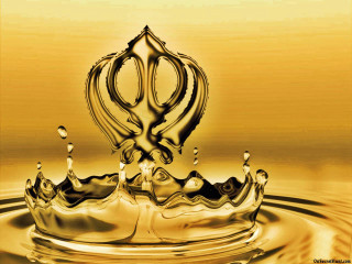 Golden crown floating water droplet - a yellow background behind free wallpaper for desktop