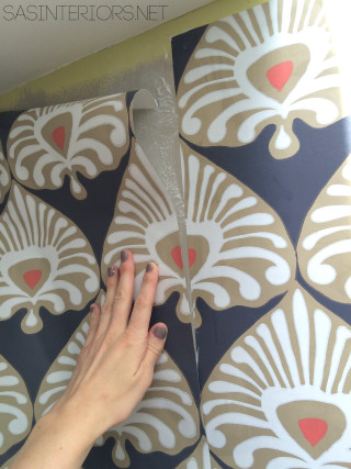 Person cutting wallpaper scissors knife - a hand free wallpaper for mobile