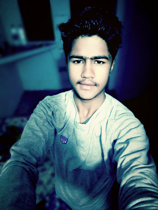 Man sitting bed blue light - bikash bhattacharjee free wallpaper