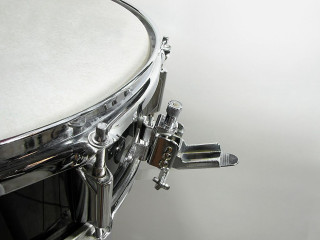 Drum head closeup white background - a white wall in the background free wallpaper