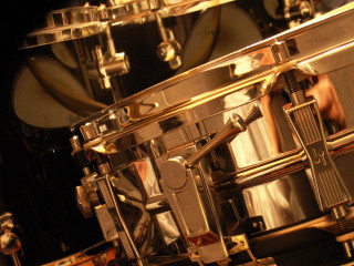 Drum set person playing black - a black background behind free wallpaper