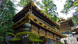 Building statue trees moss rocks - a statue in front free wallpaper