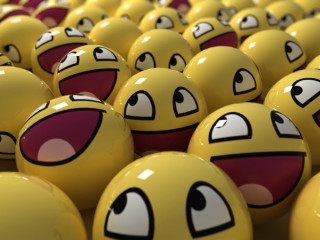 Yellow balls with faces painted 2 - different color free wallpaper